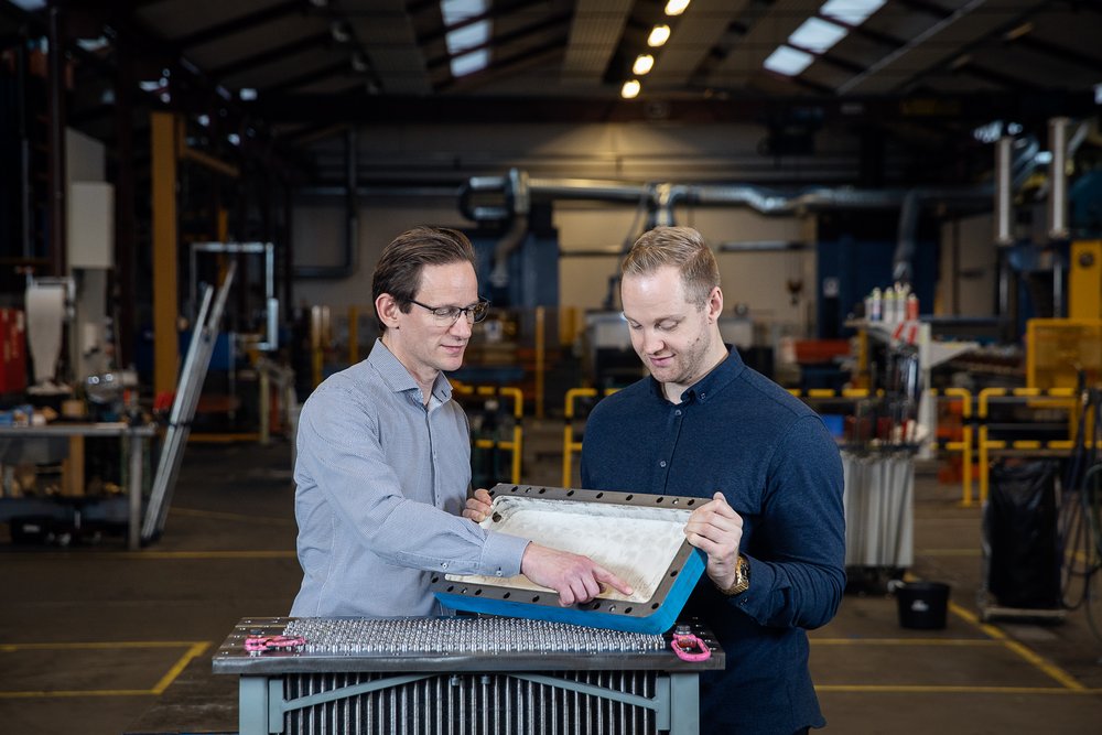 The project is headed by the Department of Engineering, Aarhus University, and R&D Manager Claus Hessler Ibsen (left) from Vestas Aircoil. Simon Heide-Jørgensen (right). Photo: Anders Trærup. 